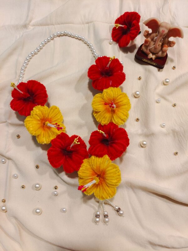 WhatsApp Image 2026-08-14 at 5.59.48 PM Hibiscus Red & Yellow Mala | Ganpati Decoration | Premium Quality | Festive Decor | Perfect for All Occasions